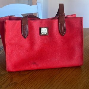 Dooney & Bourke Handbag. Scarlett Color. L: 11.5” W: 5.5” H: 8”